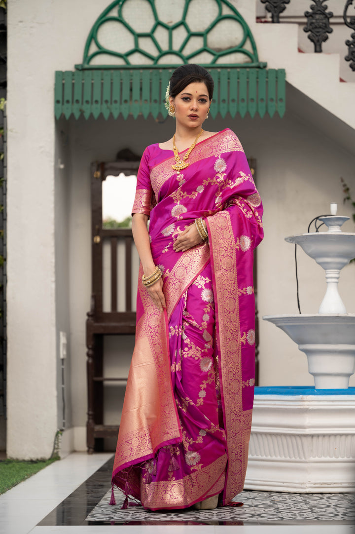 Soft Banarasi Katan silk saree featuring silver and gold zari weaves, ideal for grand events and celebrations.