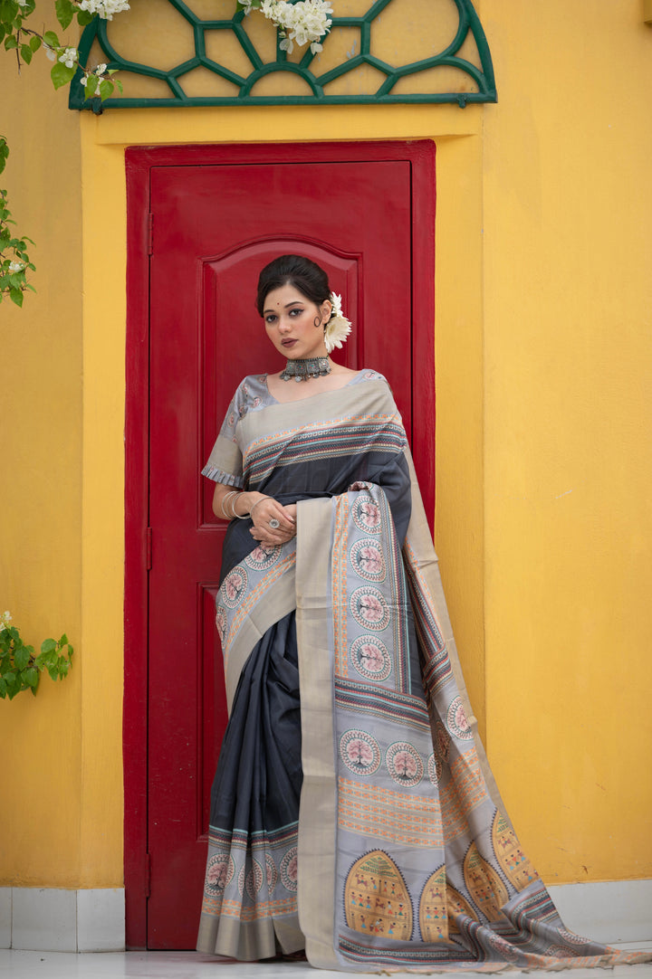 Soft Tussar print saree with Warli printed pallu and fancy tassels