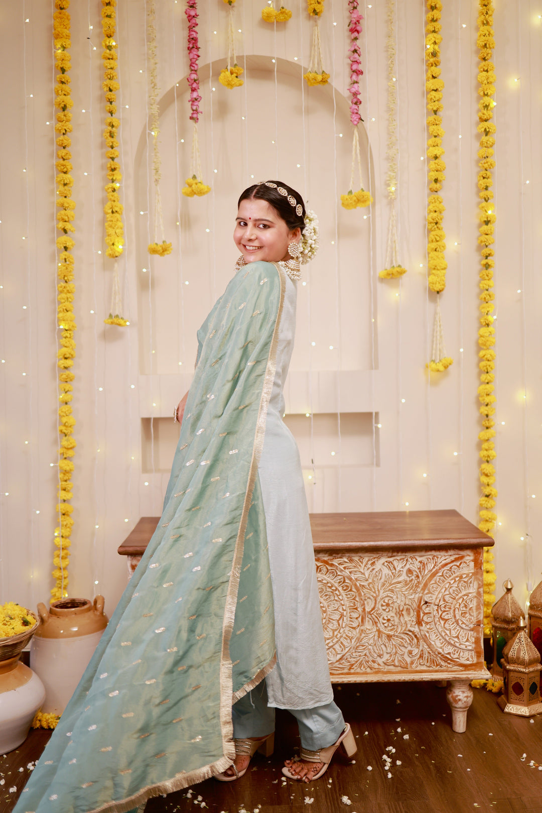 Stylish ice blue kurta pajama with a contrasting sage green dupatta, designed for modern elegance and traditional charm.