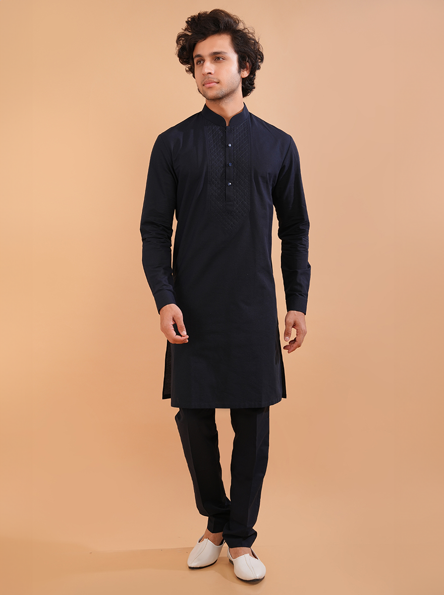 Elevate your style in the USA with this navy blue kurta pajama, featuring an embroidered design for a sophisticated look.