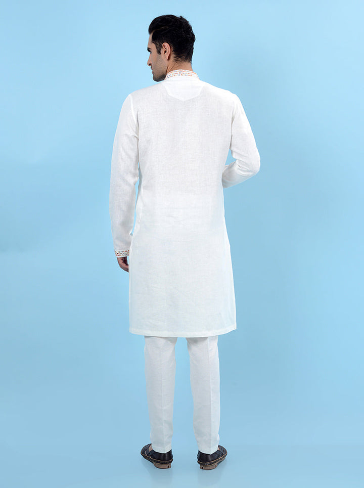 Discover this luxurious off-white kurta set, combining tradition and modern style for events in the USA.