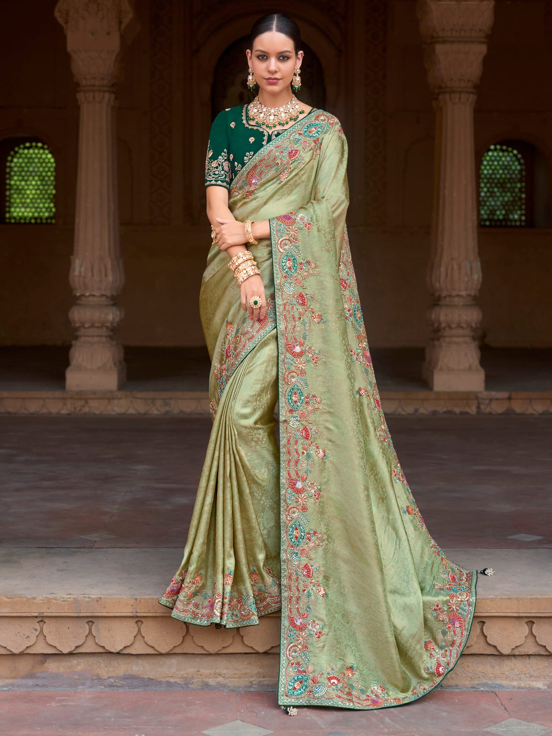 Green silk saree crafted for elegance and style.