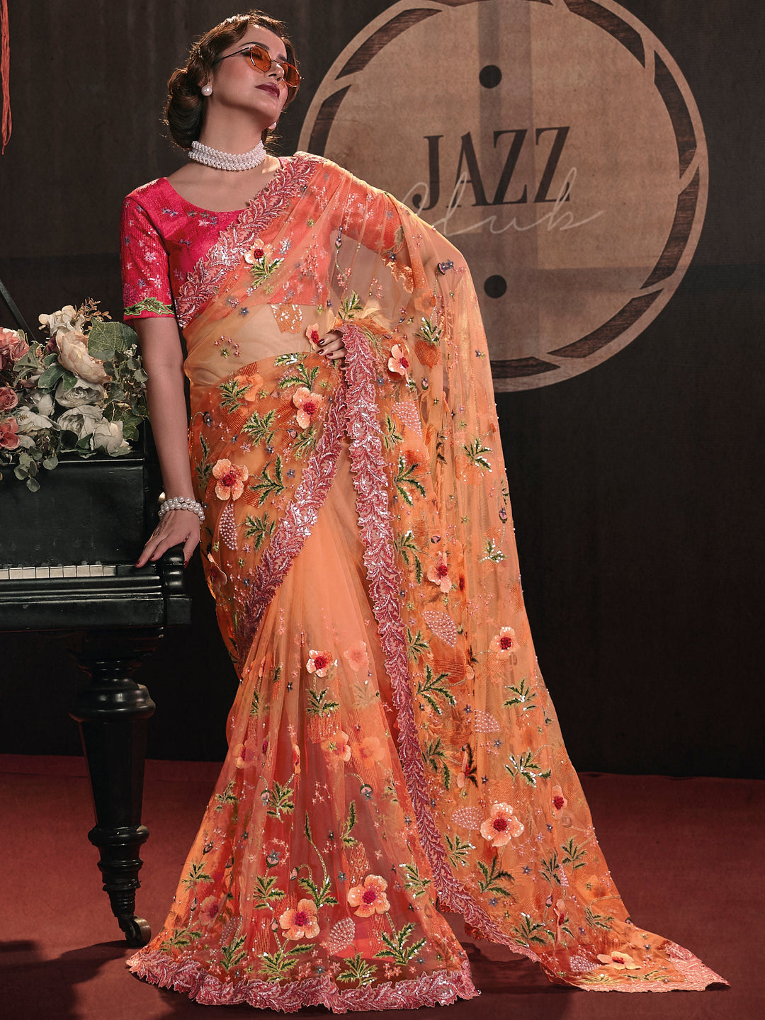 Orange silk saree crafted for elegance and style.