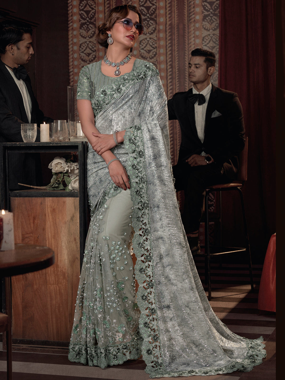 Green silk saree crafted for elegance and style.