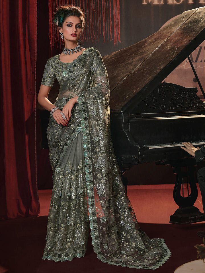 Green silk saree crafted for elegance and style.