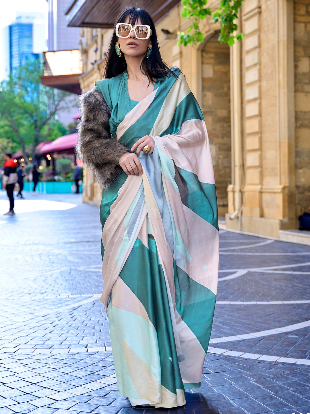 Blue satin saree crafted for elegance and style.