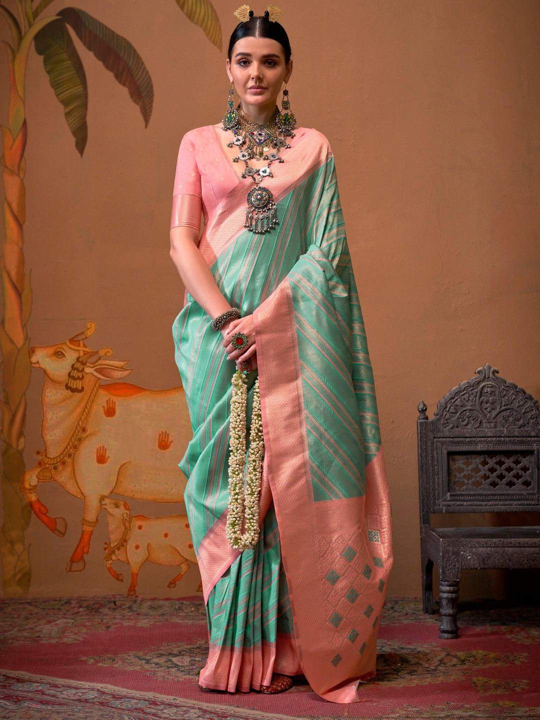 Pink silk saree crafted for elegance and style.