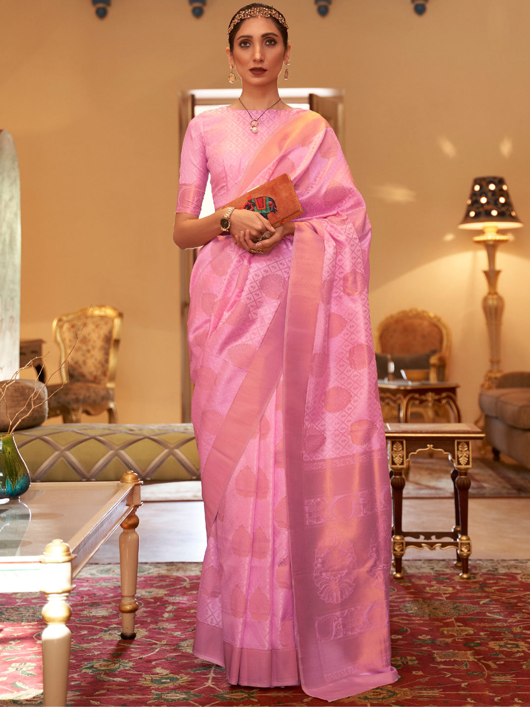 Pink silk saree crafted for elegance and style.