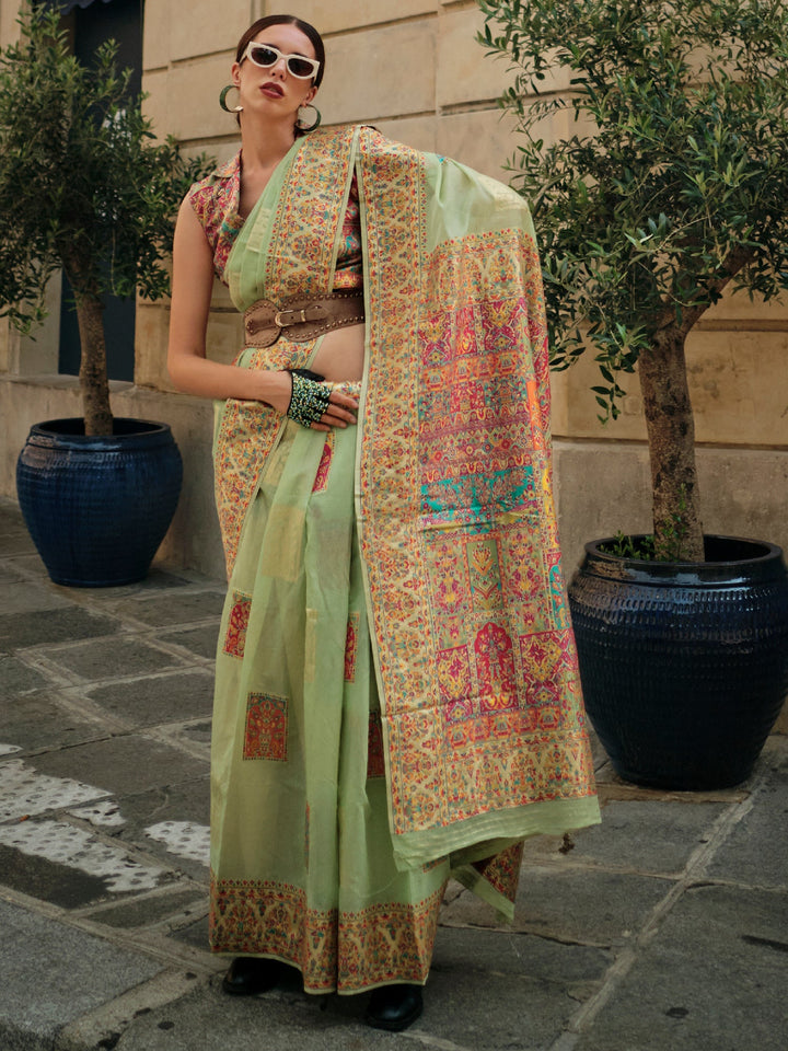 Green silk saree crafted for elegance and style.