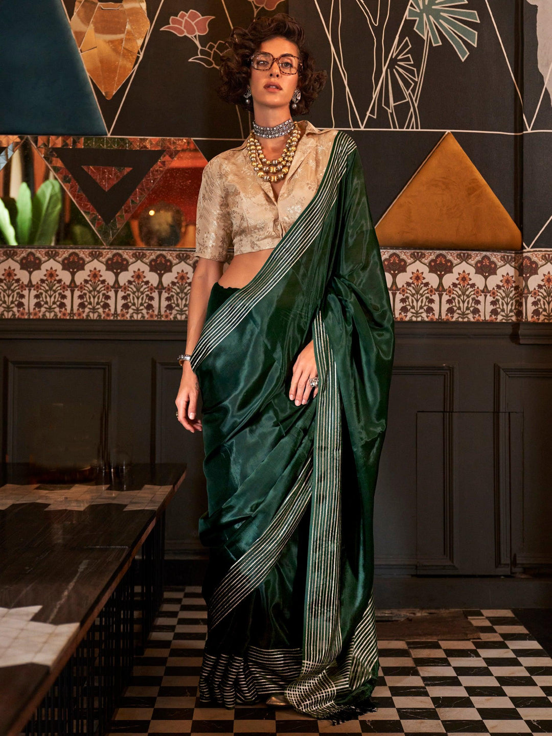 Green silk saree crafted for elegance and style.