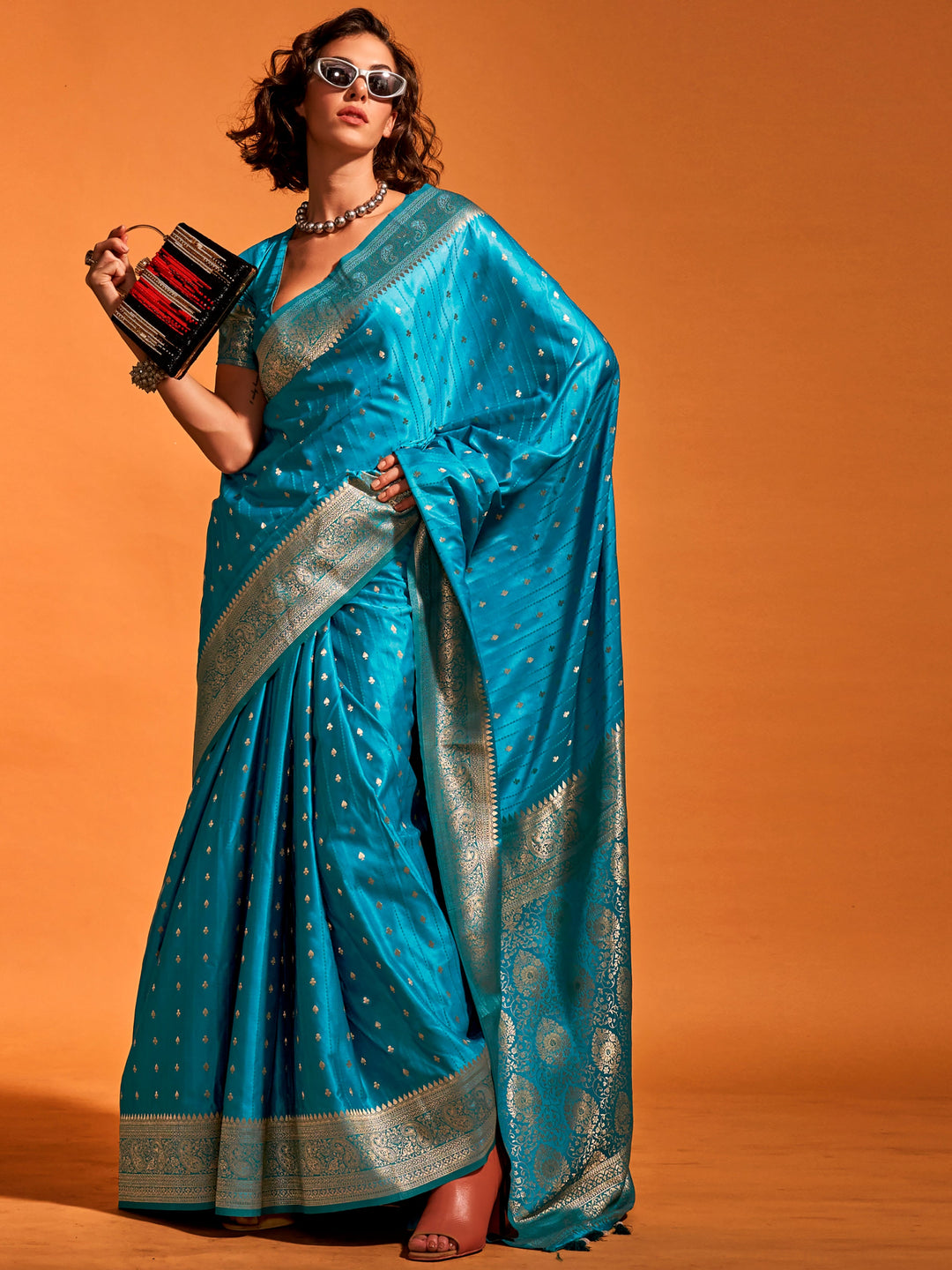 Blue satin saree crafted for elegance and style.