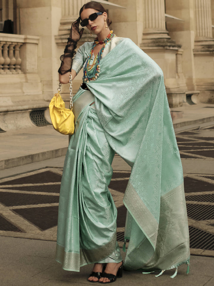 Green silk saree crafted for elegance and style.