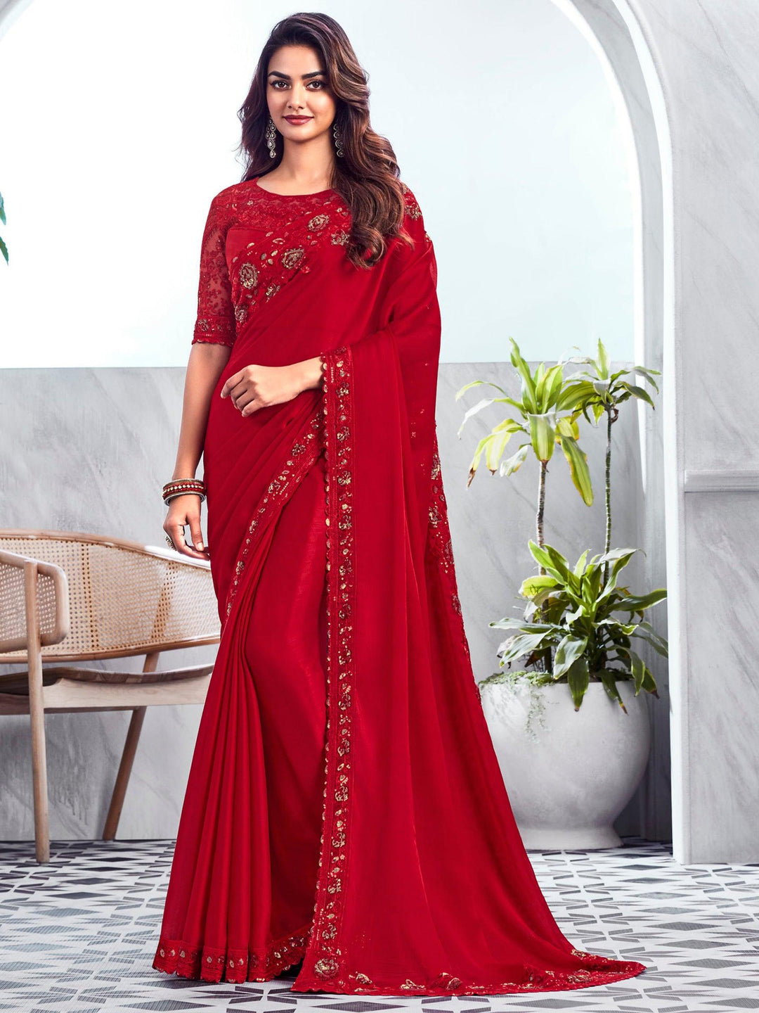 Red silk saree crafted for elegance and style.