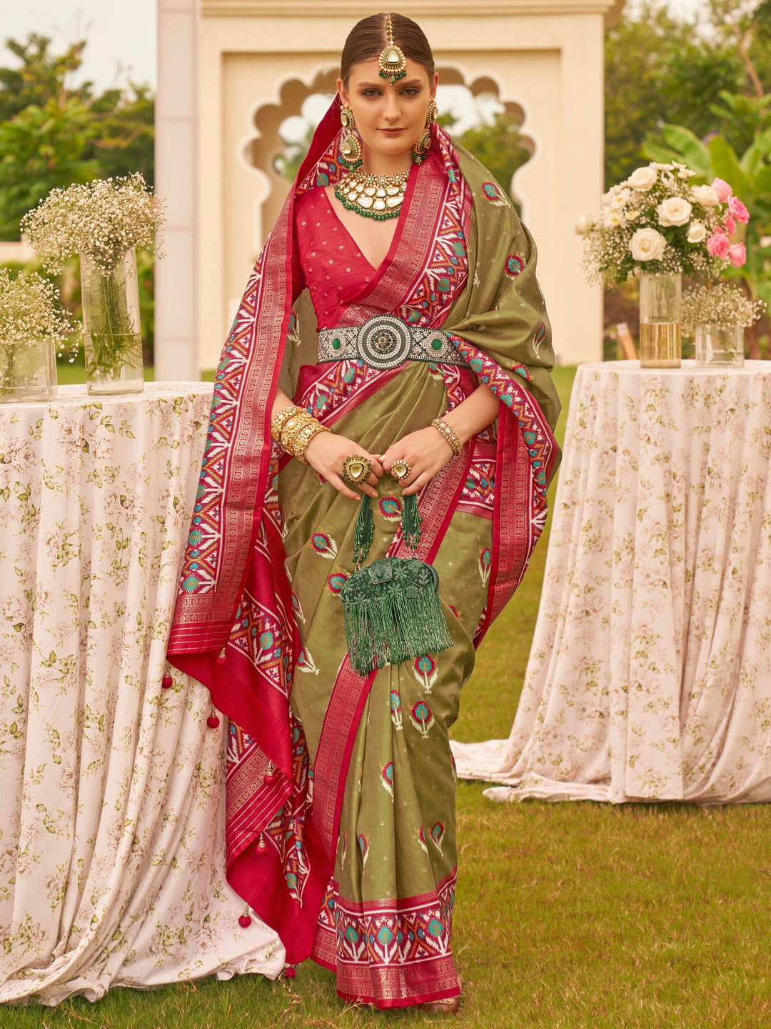 Green silk saree crafted for elegance and style.