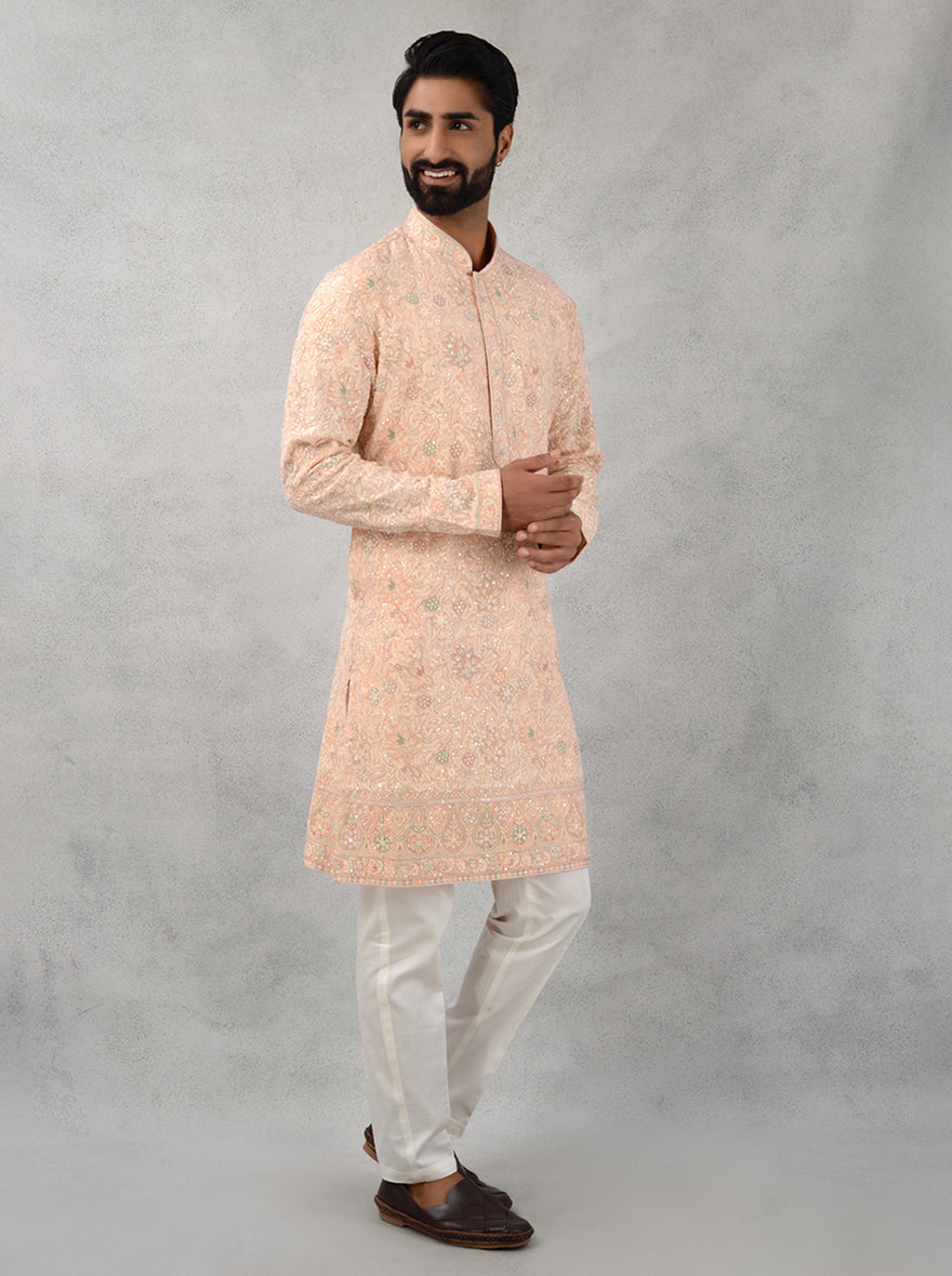 Festive peach kurta pajama with sequins, men’s USA traditional attire