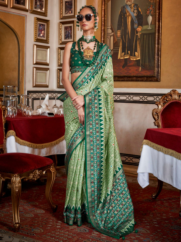 Green silk saree crafted for elegance and style.