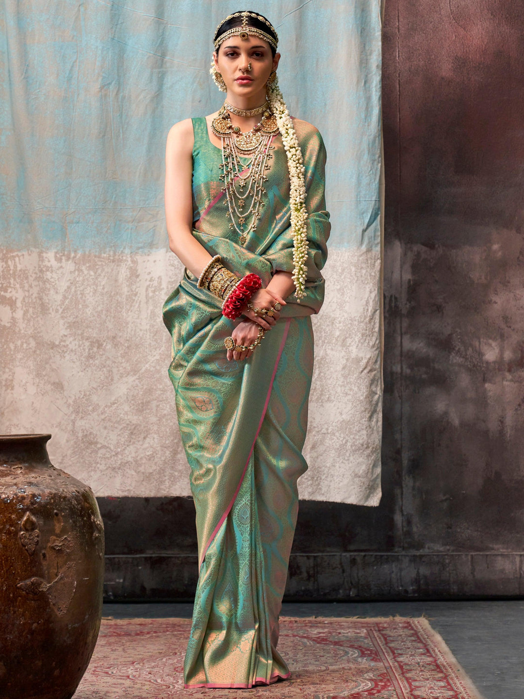 Green silk saree crafted for elegance and style.