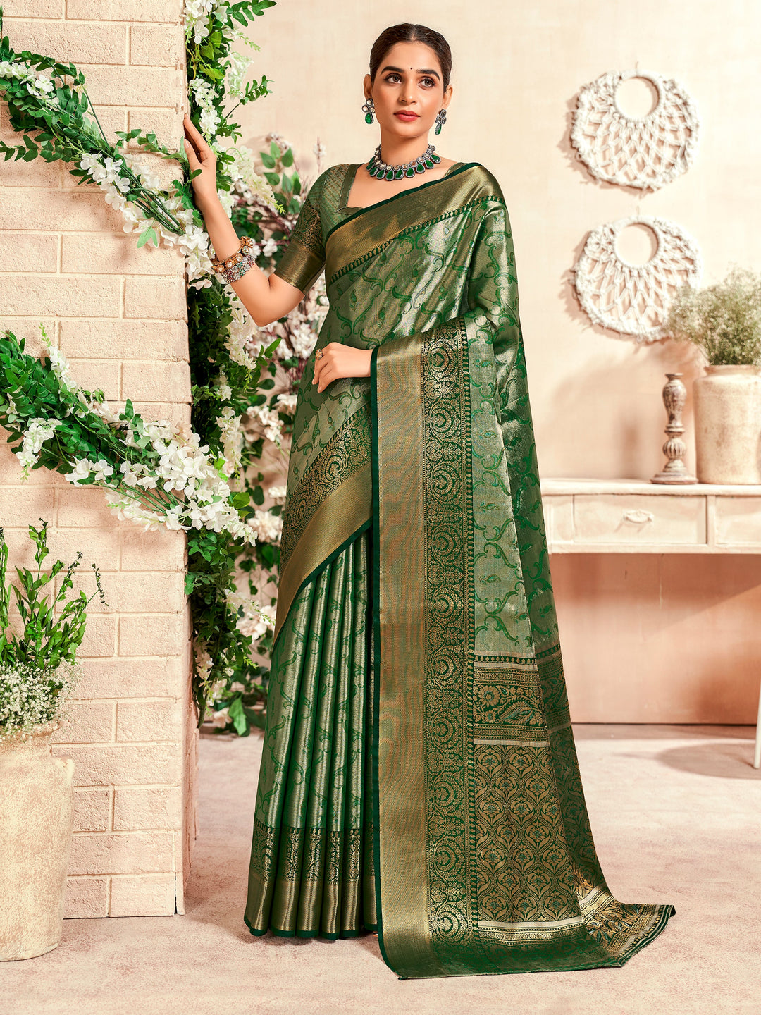 Green silk saree crafted for elegance and style.