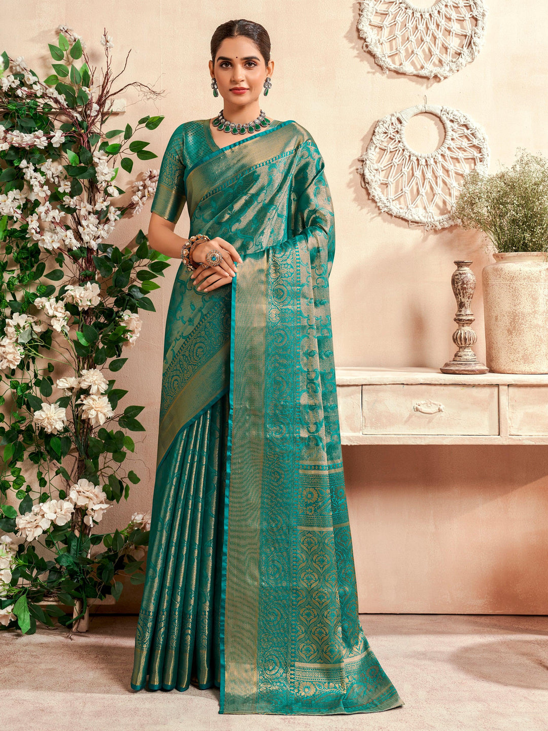 Green silk saree crafted for elegance and style.