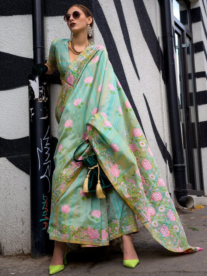 Green silk saree crafted for elegance and style.