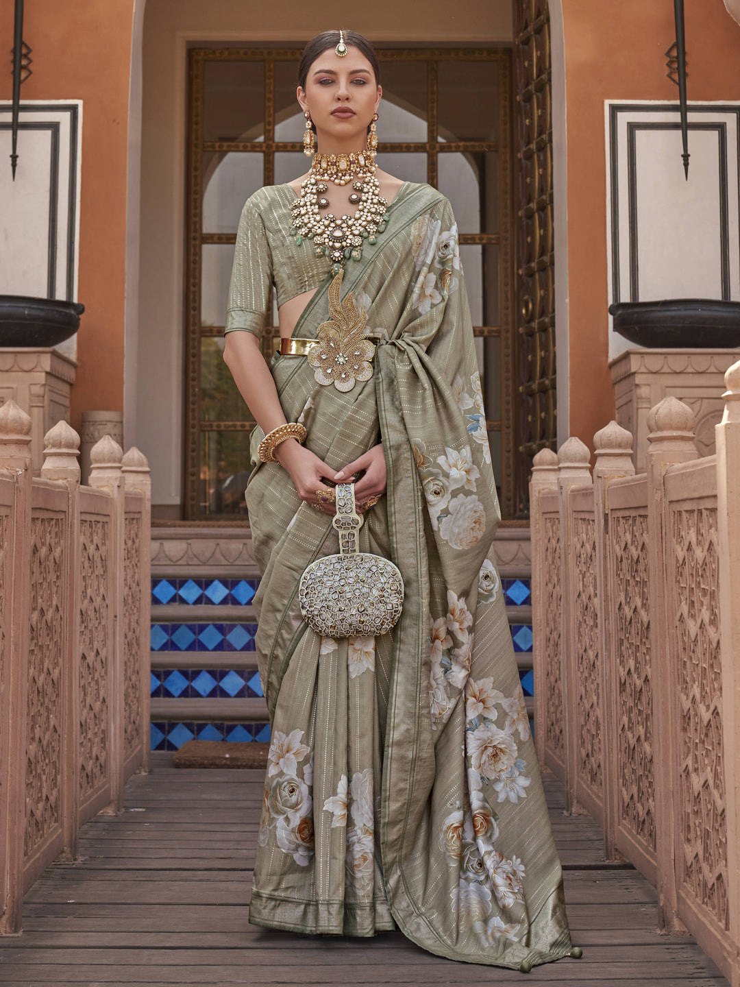 Green silk saree crafted for elegance and style.