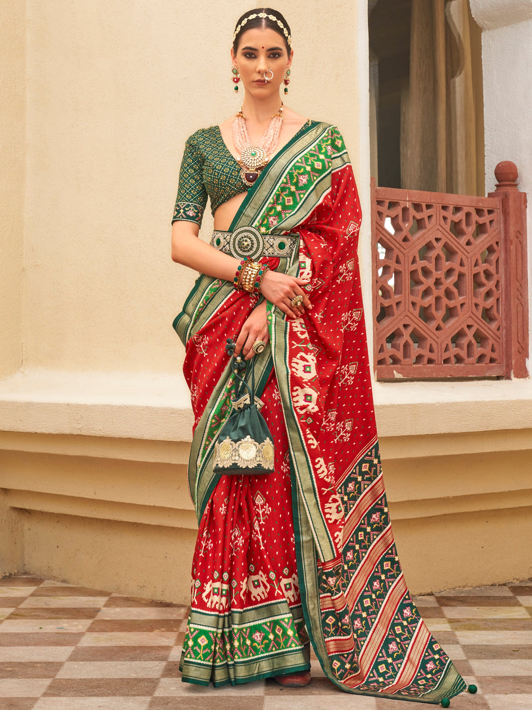 Red silk saree crafted for elegance and style.