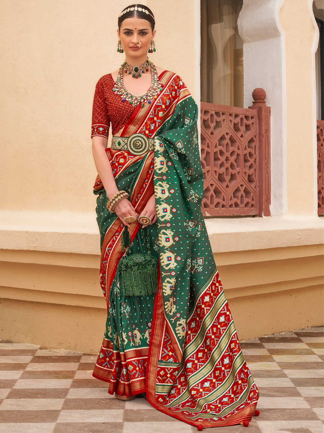 Green silk saree crafted for elegance and style.