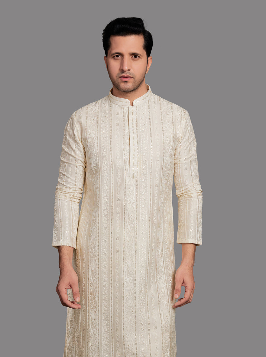 Men’s White Silk Blend Kurta Pajama with intricate embroidery for festive occasions.