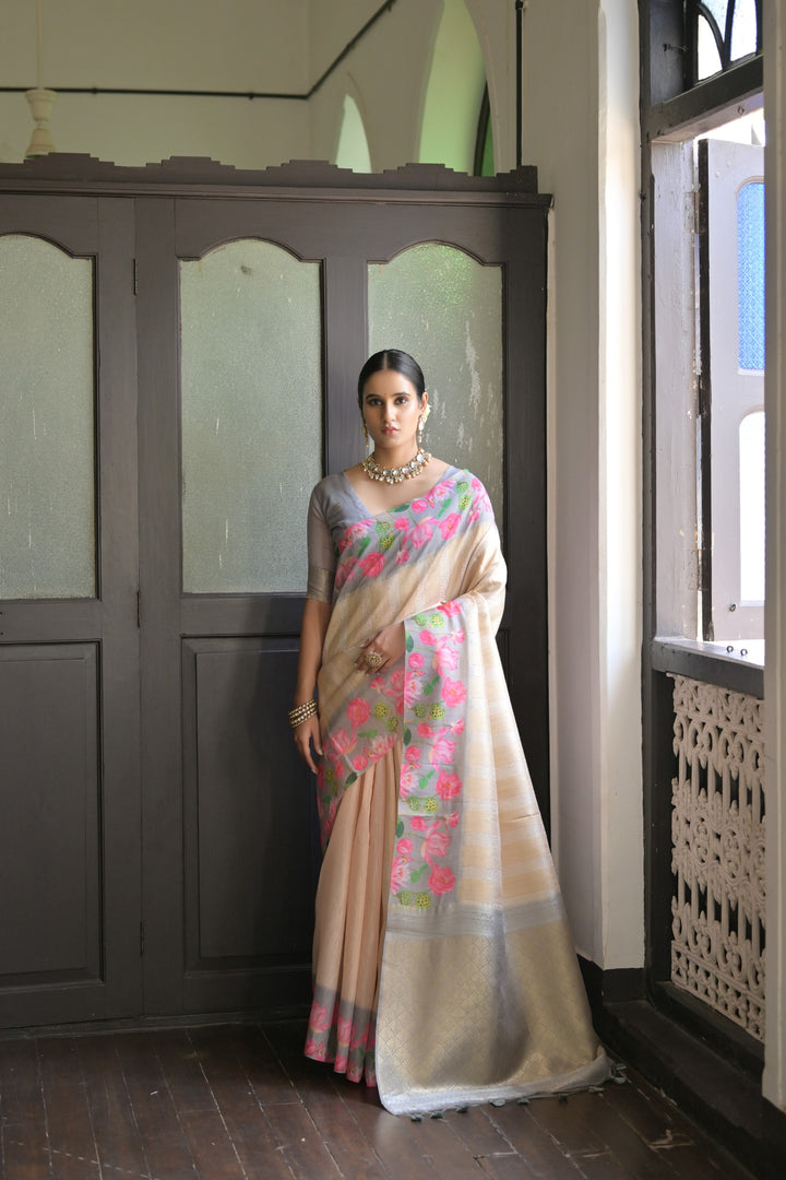 Elegant light-green soft silk saree with Pichwai lotus print and ornate zari pallu, perfect for festive occasions.