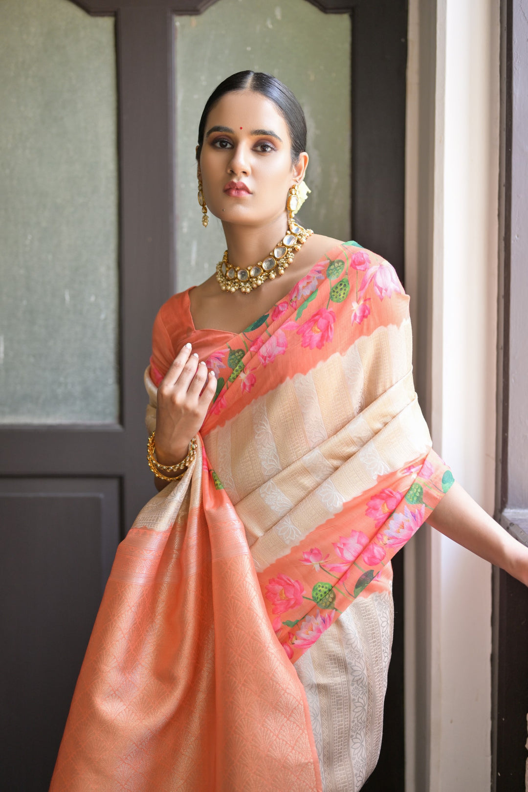 Timeless gray soft silk saree featuring Pichwai lotus print and luxurious zari pallu, ideal for evening occasions.