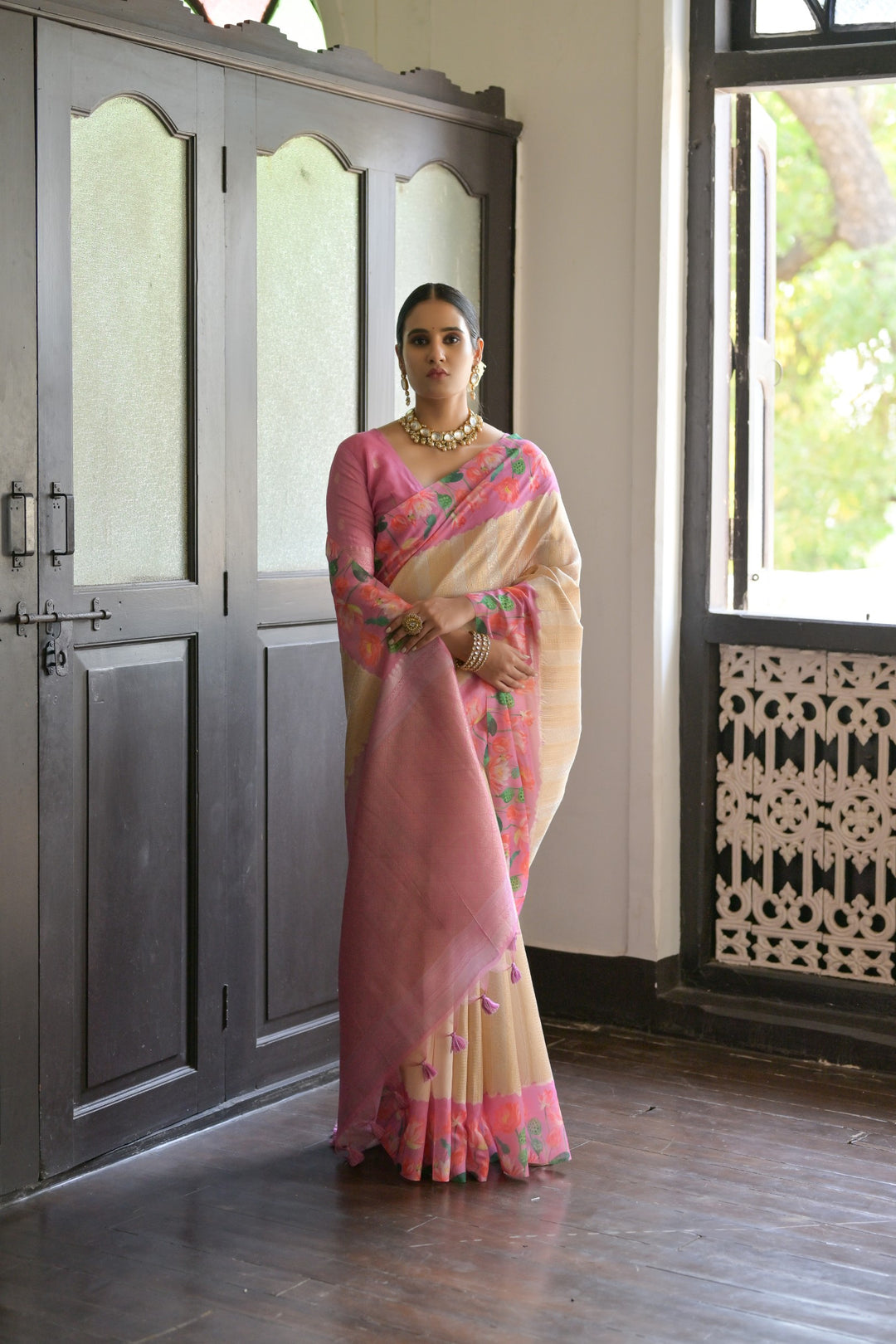 Stunning gray soft silk saree with detailed Pichwai lotus print and ornate zari pallu, perfect for weddings.