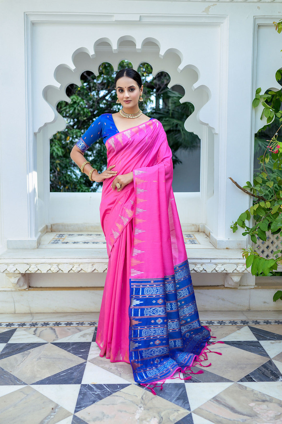 Beautiful off-white Tussar silk saree with a stunning temple border and vibrant Ikkat pallu, ideal for weddings.