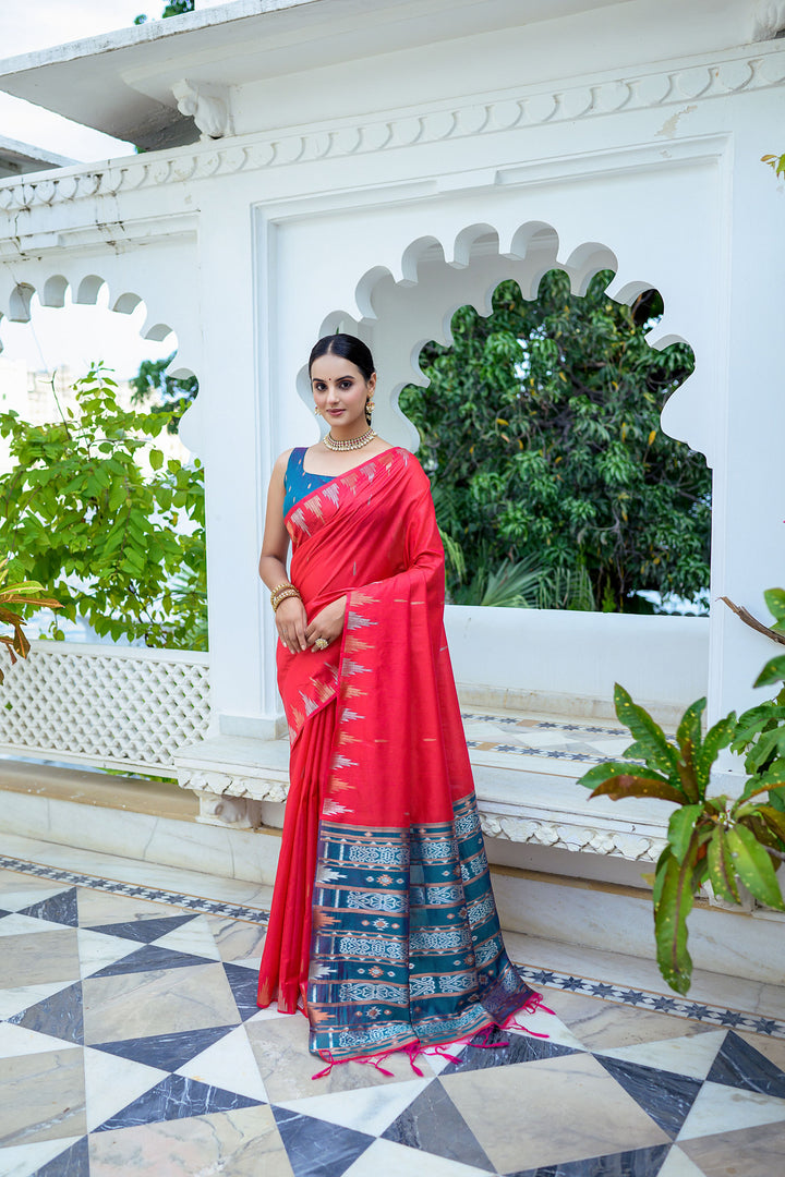 Elegant pink Tussar silk saree featuring a rich temple border and a stylish Ikkat pallu, perfect for weddings.