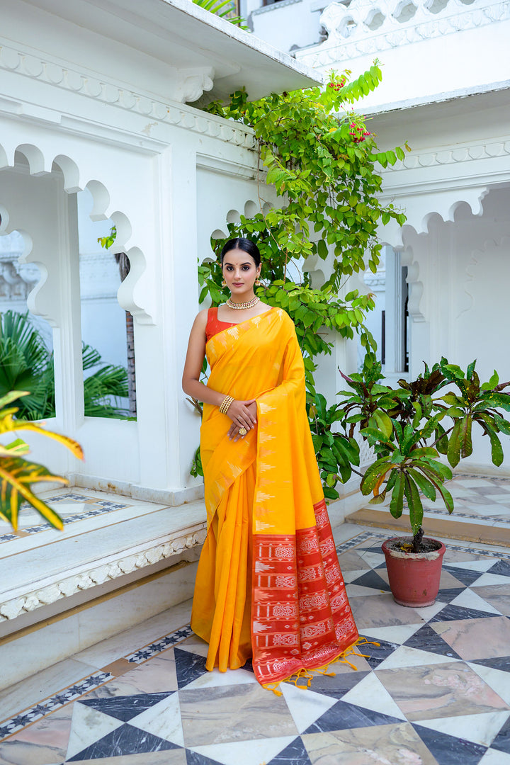 Timeless grey Tussar silk saree with a chic temple border and Ikkat pallu, perfect for evening functions.