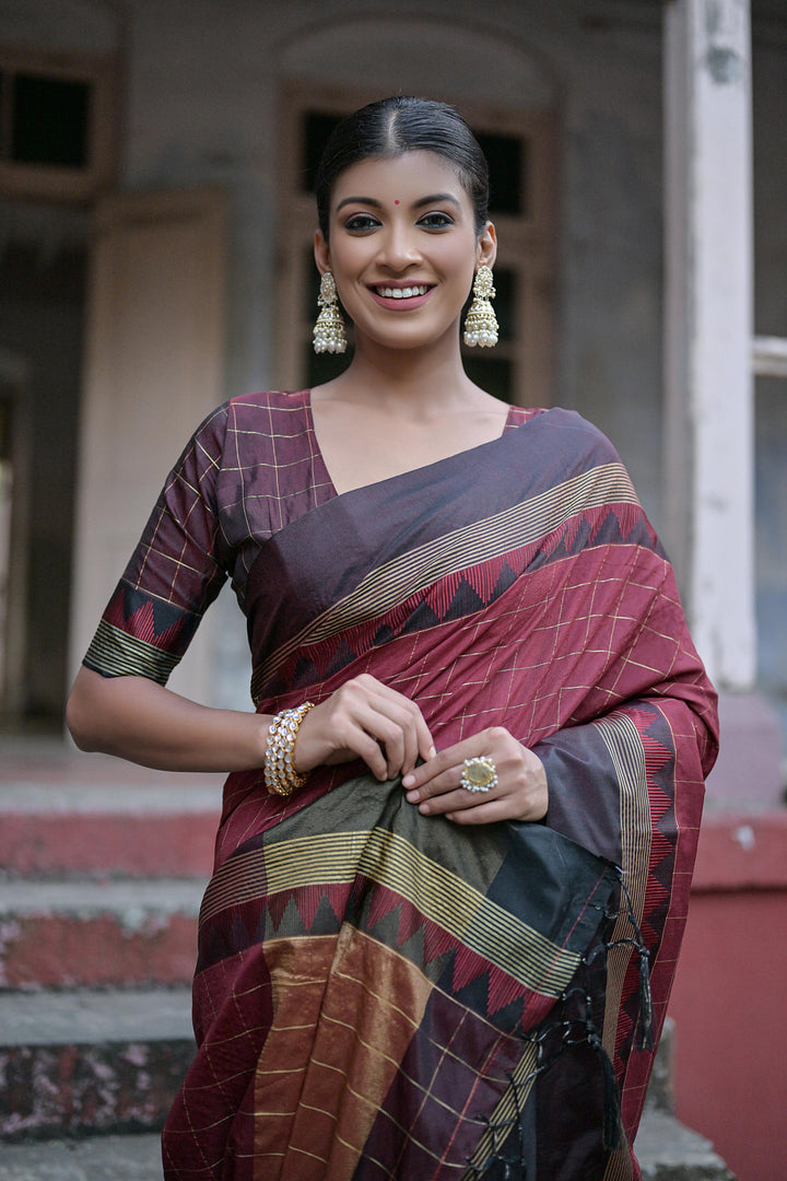 Soft raw silk saree with all-over checks and contrast temple woven border