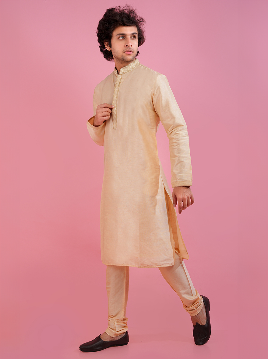 Experience luxury with this intricate light gold kurta pajama set, perfect for stylish celebrations.