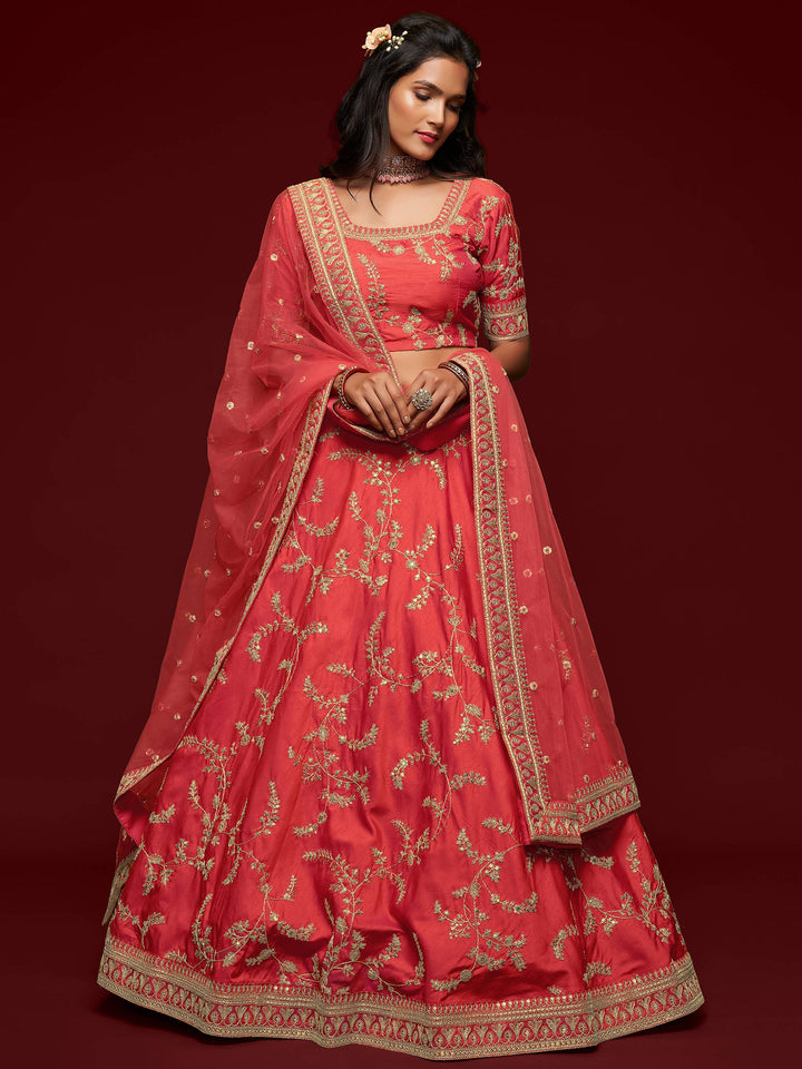 Bridal lehenga with embroidered choli and net dupatta for events.