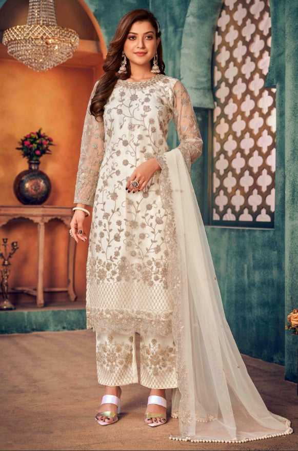 Elegant off white salwar kameez, USA celebration attire, refined traditional wear.