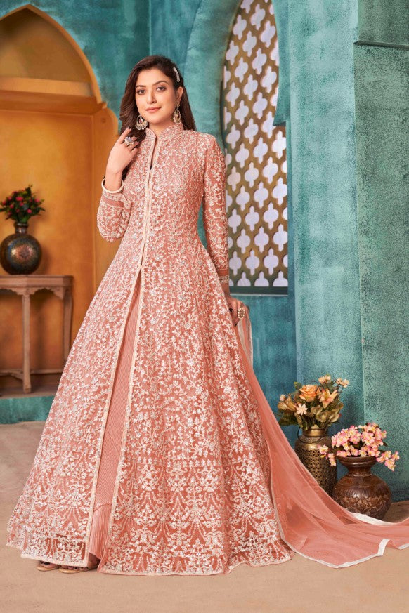 Beautifully crafted peach salwar kameez, ideal for weddings and gatherings with luxurious fabric and stylish fit.