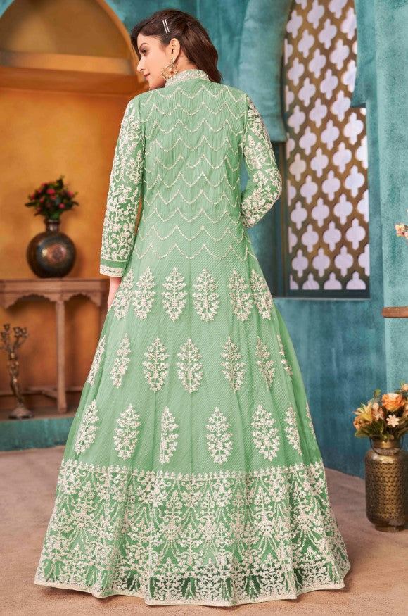 Elegant light green salwar kameez showcasing modern design, perfect for women celebrating cultural events in the USA.