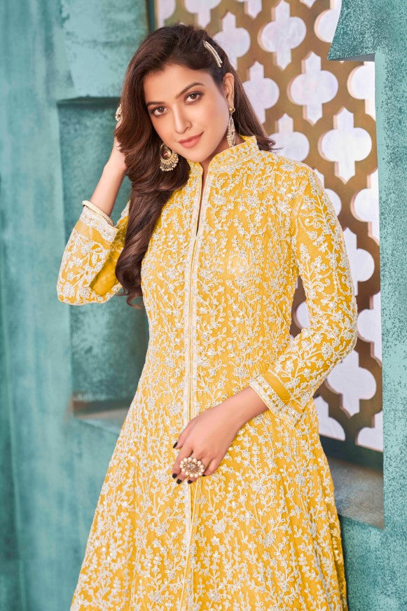 Joyful yellow salwar kameez, featuring fine embroidery for a bright and elegant look, perfect for celebrations.