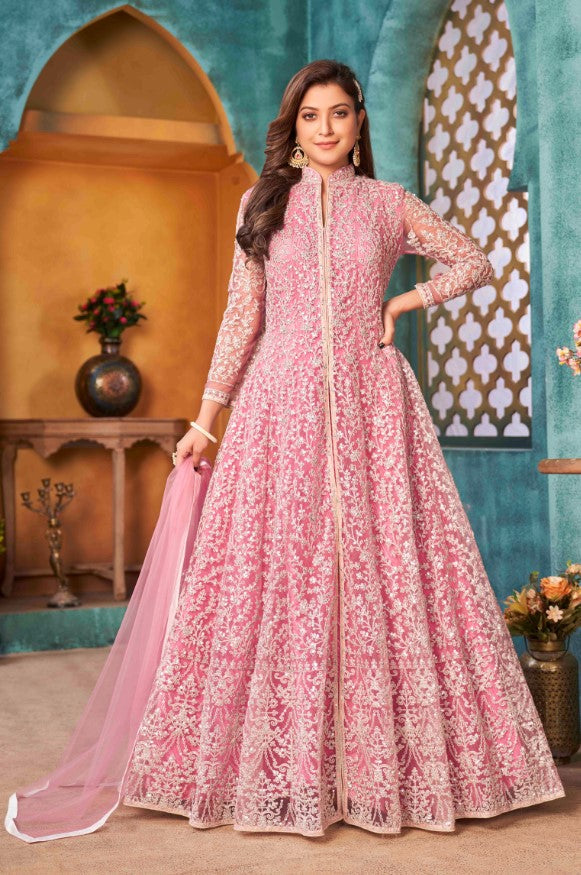 Elegant pink salwar kameez featuring intricate detailing, perfect for enhancing your wardrobe for special celebrations.