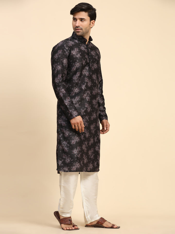 Men’s black kurta set with floral Midnight Blossom print, ideal for Sangeet celebrations and festive wear.