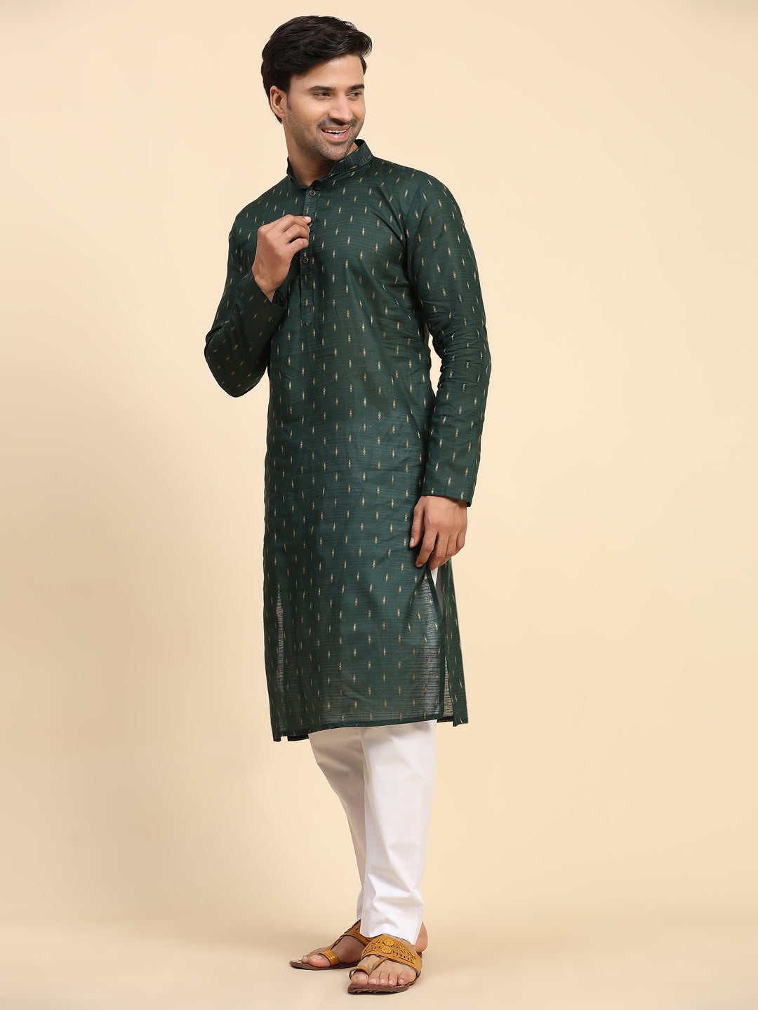 Embroidered dark green men's kurta pajama for weddings and festive events.