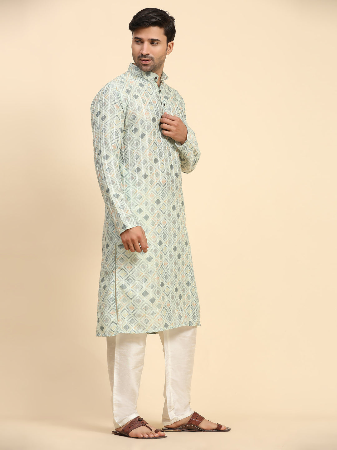 Elegant light green kurta set for men with digital print for Mehandi ceremony.