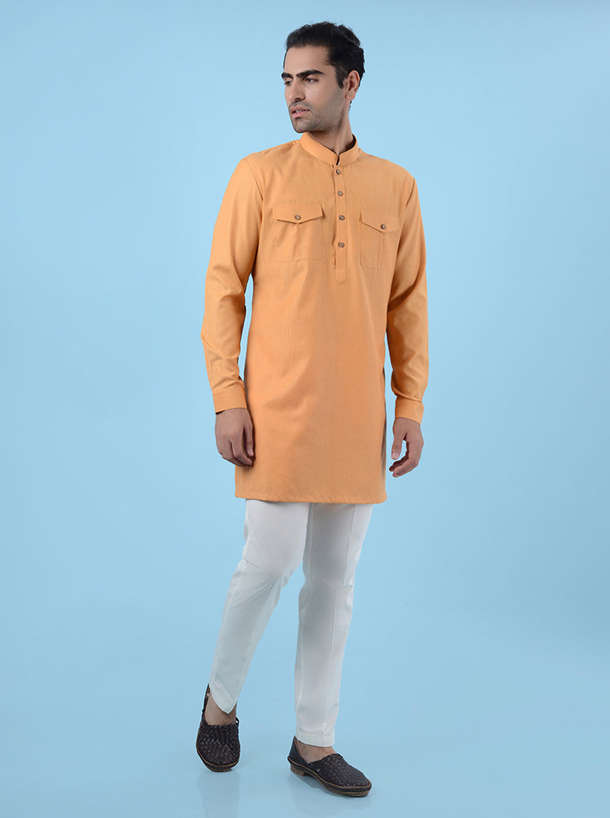 Men's elegant orange silk blend kurta pajama, perfect for special events and traditional wear.