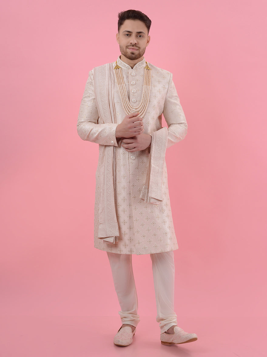 Elevate your formal look with this Pink Silk Blend Sherwani, showcasing intricate embroidery for a stunning wedding style.