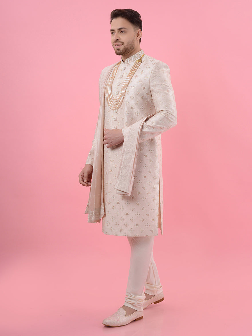 This exquisite Pink Silk Blend Sherwani features intricate embroidery, perfect for weddings in the USA, blending tradition and modernity.