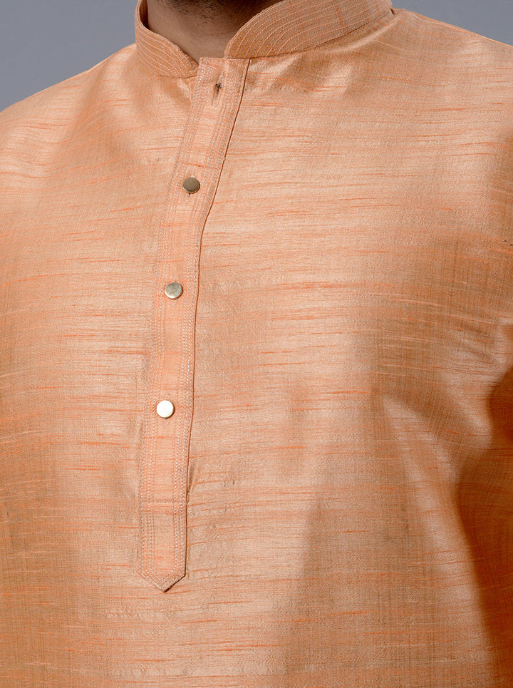 Versatile kurta pajama in coral peach, perfect for festive events.