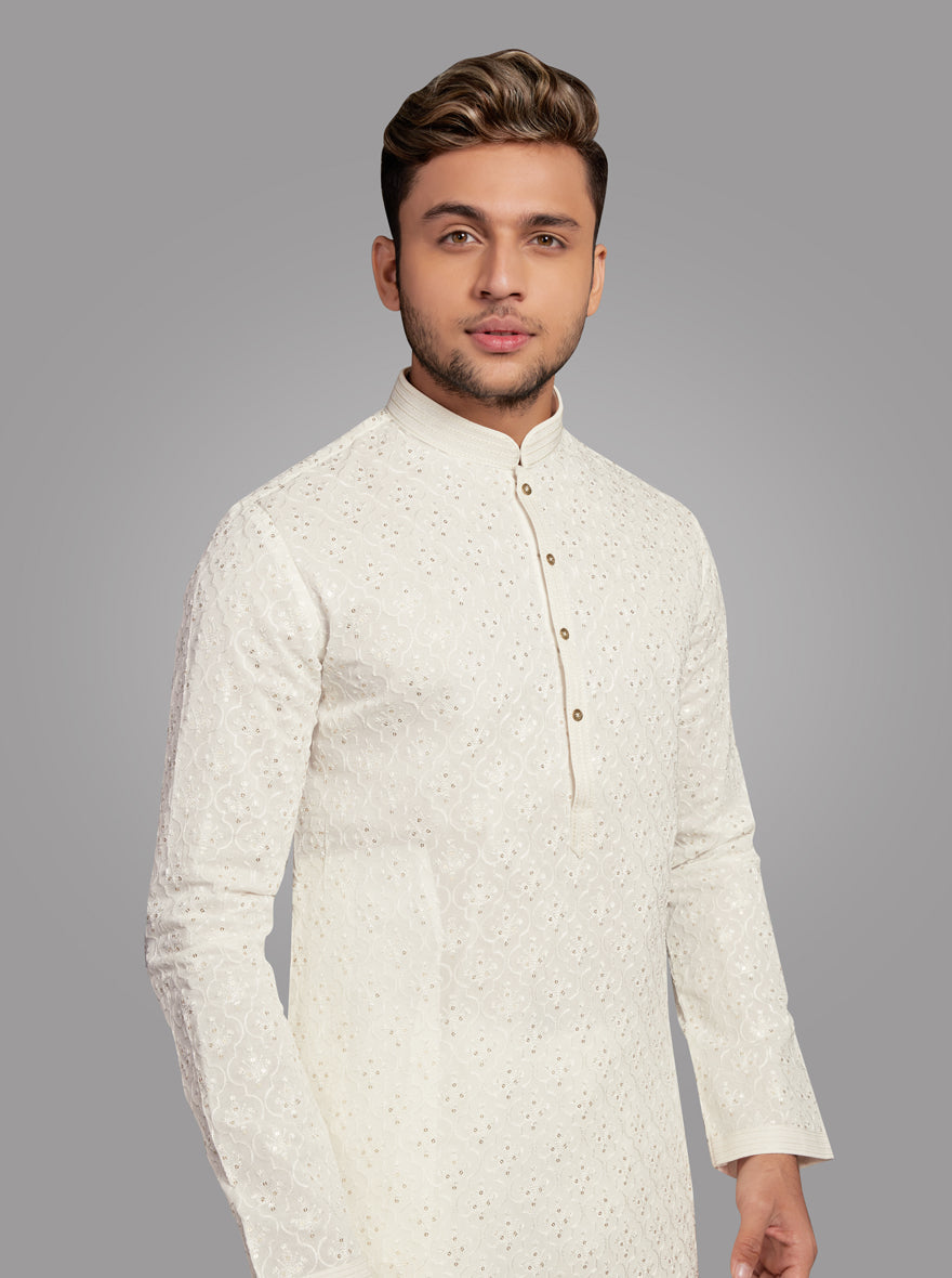 Elegant Off White Kurta Set for men with traditional embroidery, perfect for family gatherings and celebrations.